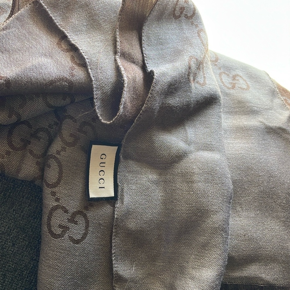 Authentic unisex Gucci Brown Gray GG scarf. 
Measures 45 x180 cm